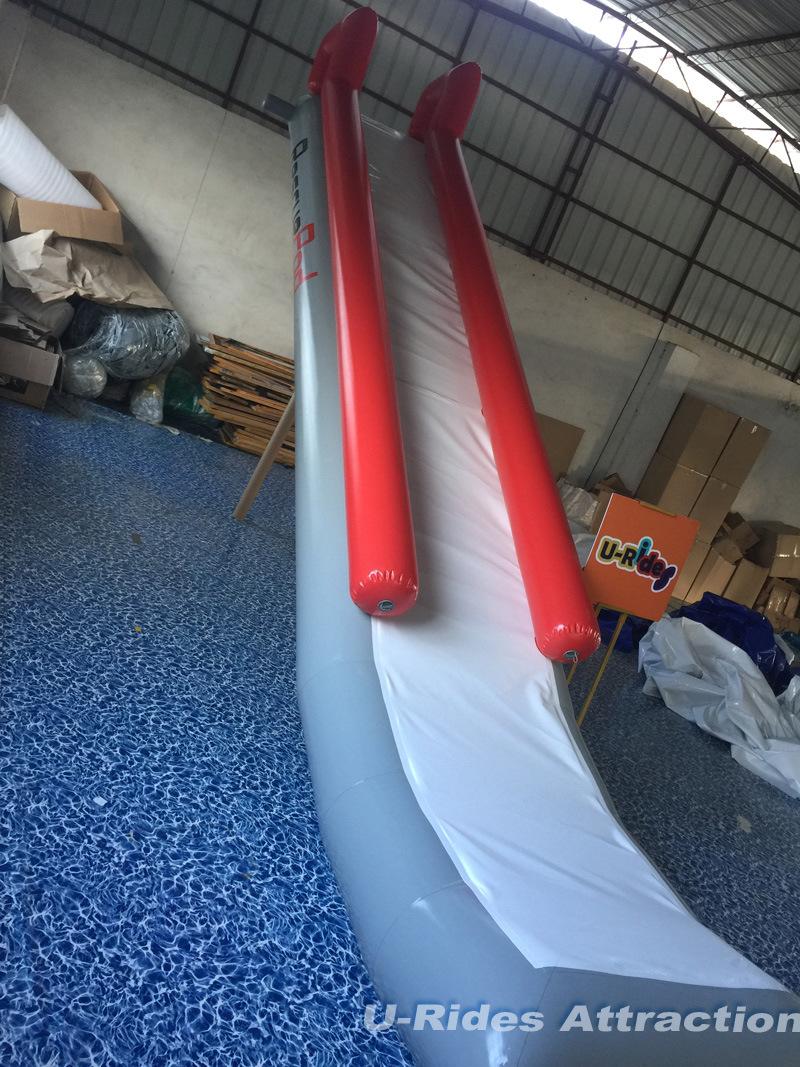 Inflatable Yacht Slide in the sea Challenge for Boat Business Rental