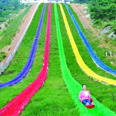 Custom Amusement Park Outdoor Grass Rainbow Slide Kids Playground Equipment
