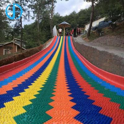 China Supply Outdoor Playground Plastic Dry Ski Rainbow Snow Slip Slide Fun Park Equipment for Amusement Park