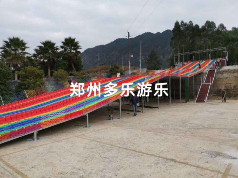 China Supply Outdoor Playground Plastic Dry Ski Rainbow Snow Slip Slide Fun Park Equipment for Amusement Park